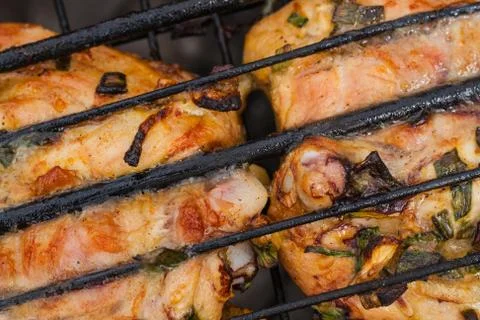 Chicken meat on fire .  It is appetizingly prepared Stock Photos
