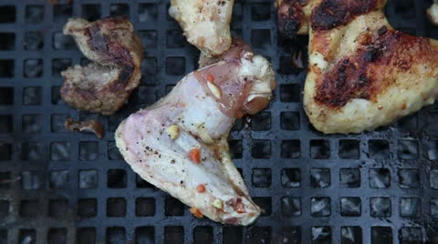 Chicken meat on grill Stock Footage 24729462