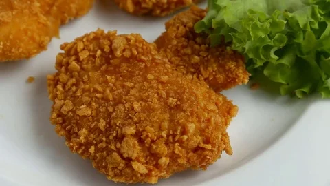 Chicken nuggets in breadcrumbs Stock Footage 74625364