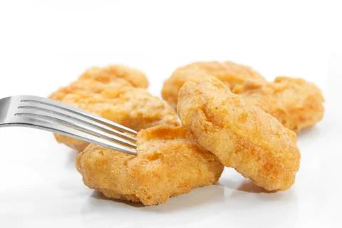 Chicken nuggets with fork Stock Photos