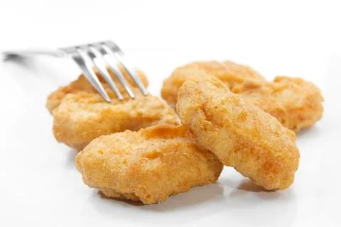 Chicken nuggets with fork Stock Photos