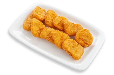 Chicken nuggets on a white rectangular ceramic plate. White background. Isola Stock Photos