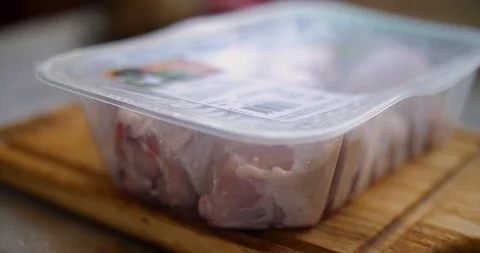 Chicken package opening Stock Footage 87861074