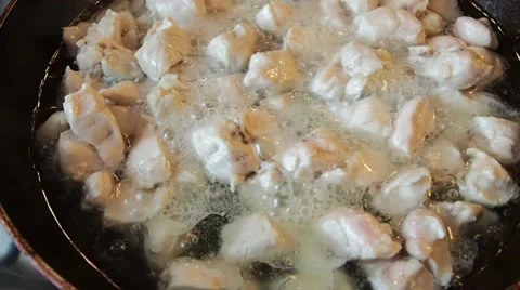 Chicken in a pan Stock Footage 67354839