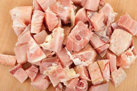 Chicken pieces on the board Stock Photos