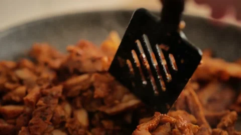 Chicken pieces in a frying pan.Cooking process. Stock Footage 233627313