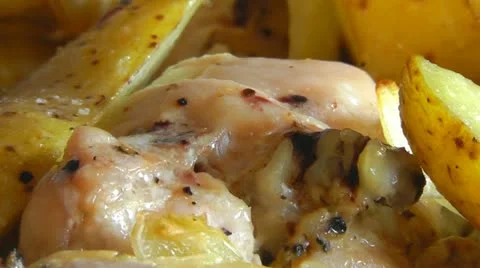 Chicken with potatoes baked Stock Footage 10875058