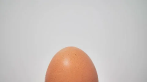 Chicken raw egg are spinning on a turntable. View from above. Close-up. food Video stock 222642635