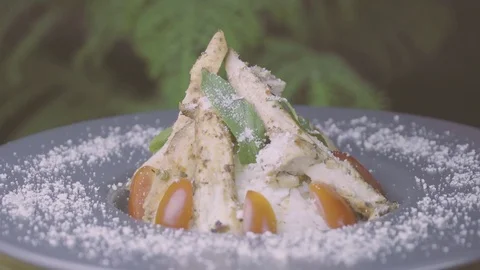 Chicken, rice and vegetables rotating on plate. Stock Footage 78057376