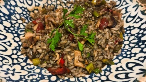 Chicken risotto cooked in white wine with onions, parmesan and fresh herbs. Stock Footage 327061140