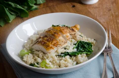 Chicken with risotto Stock Photos