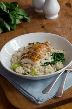 Chicken with risotto Stock Photos