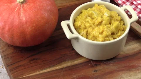 Chicken risotto with pumpkin, close-up Stockbeeldmateriaal 253254804