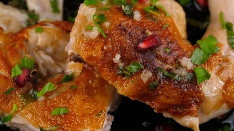 Chicken roasted, close-up view, with garnet seeds and parsley Stock Footage 83165720