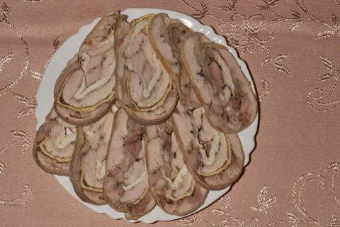 Chicken roll. Slicing. Stock Photos
