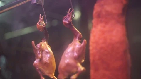 Chicken rotating on a skewer. Video stock 75383025