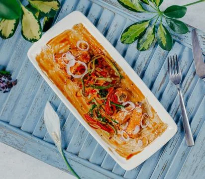 Chicken roulets with vegetables on the table Stock Photos