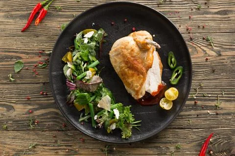Chicken with salad Stock Photos