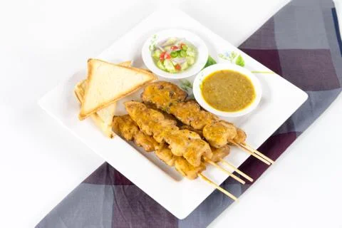 Chicken satay with bread 写真素材