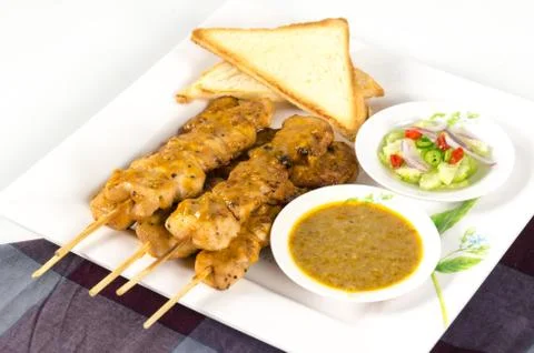 Chicken satay with bread Stock Photos
