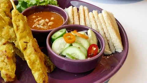 Chicken Satay with peanut sauce Stock Footage 78019669