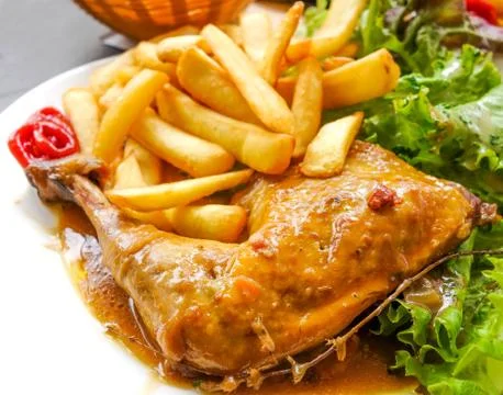 Chicken with sauce Stock Photos