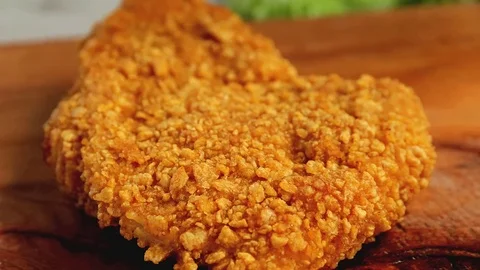 Chicken schnitzel in breaded chops cut Stock Footage 74626448