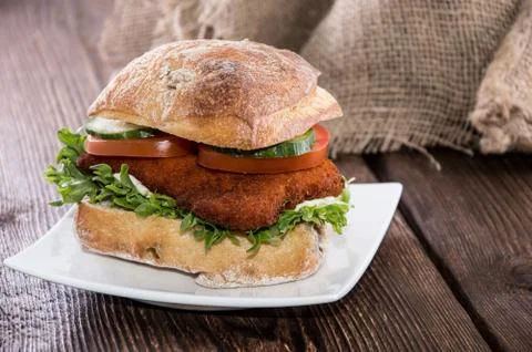Chicken schnitzel on a roll Stock Photos