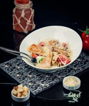 Chicken seasar salad on the table Stock Photos