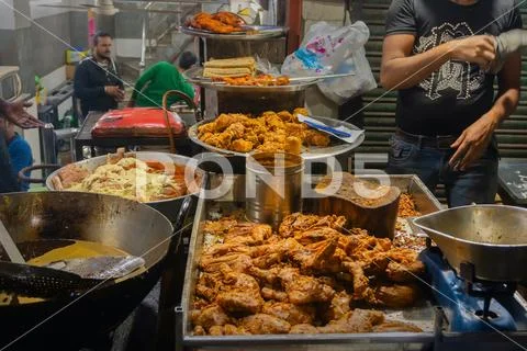 Chicken seekh kababs are being prepared road side Stock Photos