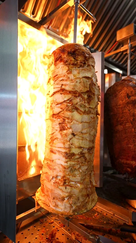 Chicken Shawarma Spit Roasting Beside Open Flames Stock Footage 340009225
