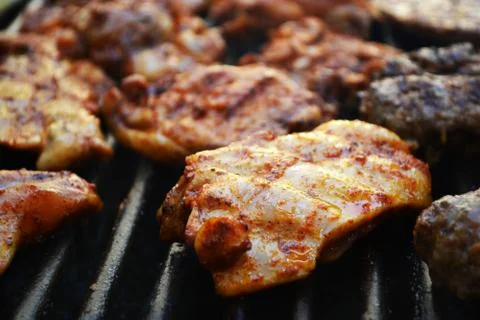 Chicken slice on the grill Stock Photos