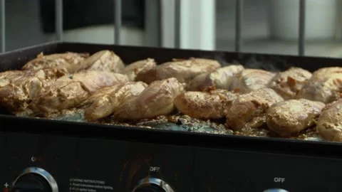 Chicken slow grilling Stock Footage 166538611