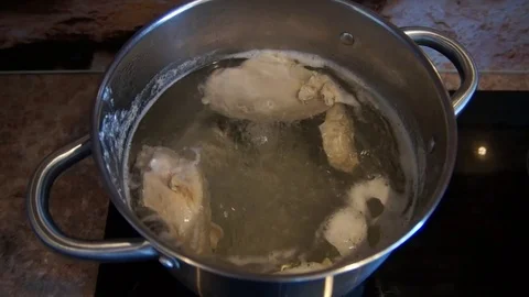 Chicken soup cooking Stock Footage 77827326