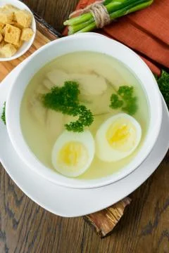 Chicken soup with egg Stock Photos