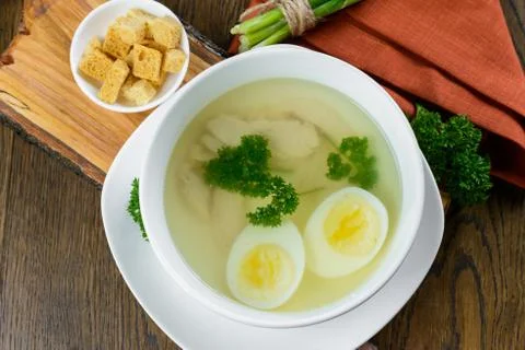 Chicken soup with egg Stock Photos