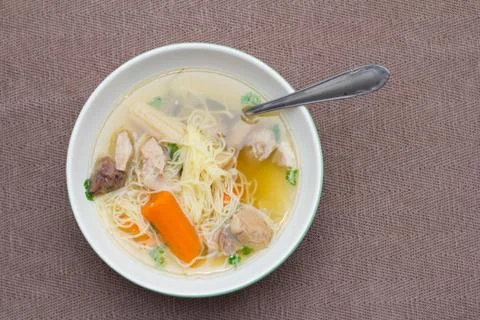 Chicken soup on plate Stock Photos