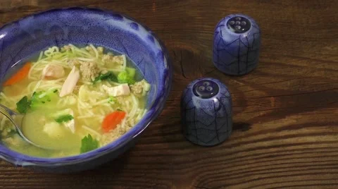 Chicken soup with vegetables Stock Footage 66680511