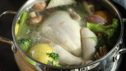 Chicken soup with vegetables, top view	 Stock Footage 320857159