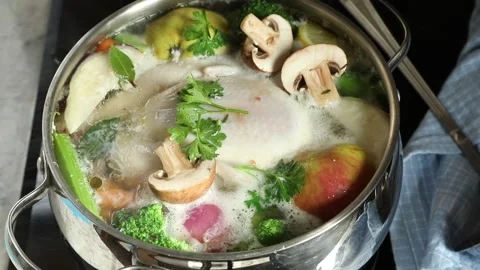 Chicken soup with vegetables, top view	 Stock Footage 320857160