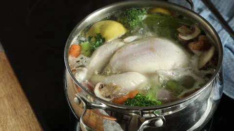 Chicken soup with vegetables, top view	 Stock Footage 320857161