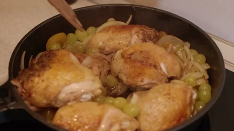 Chicken with spice on frying pan 스톡 동영상 155996340