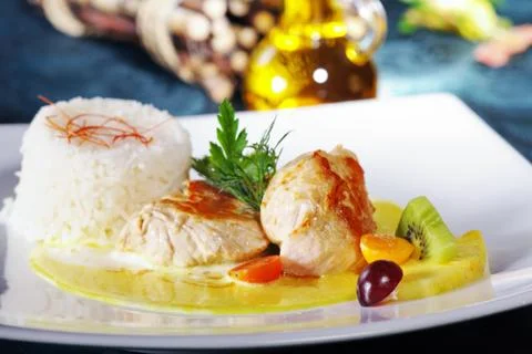 Chicken steak with garnish Stock Photos