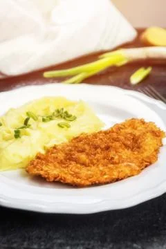 Chicken steak or schnitzel with mashed potatoes Stock Photos