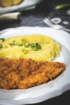 Chicken steak or schnitzel with mashed potatoes Stock Photos