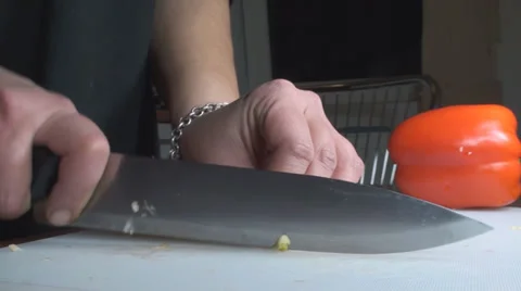 Chicken Stroganoff Slicing The Garlic Side-Shot Stock Footage 34221342