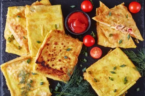 Chicken Stuffed moroccan flatbread, flat lay Stock Photos