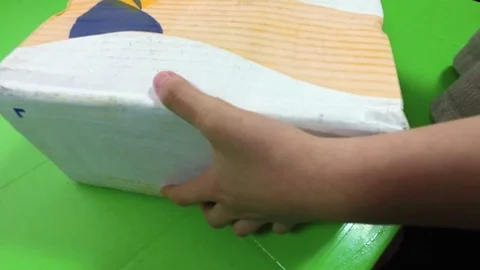 Chicken thigh in a box. Opens the box. Stock Footage 83962430