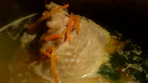 Chicken thigh soup Stock Footage 273409300