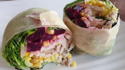Chicken vegetable salad wrap clean healthy food meat beatroot corn and gree.. Video stock 253074833